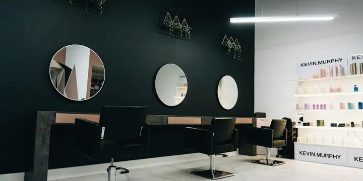 Hair salon with styling chairs and mirrors