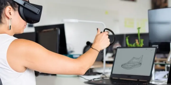 Product designer working with a virtual reality headset